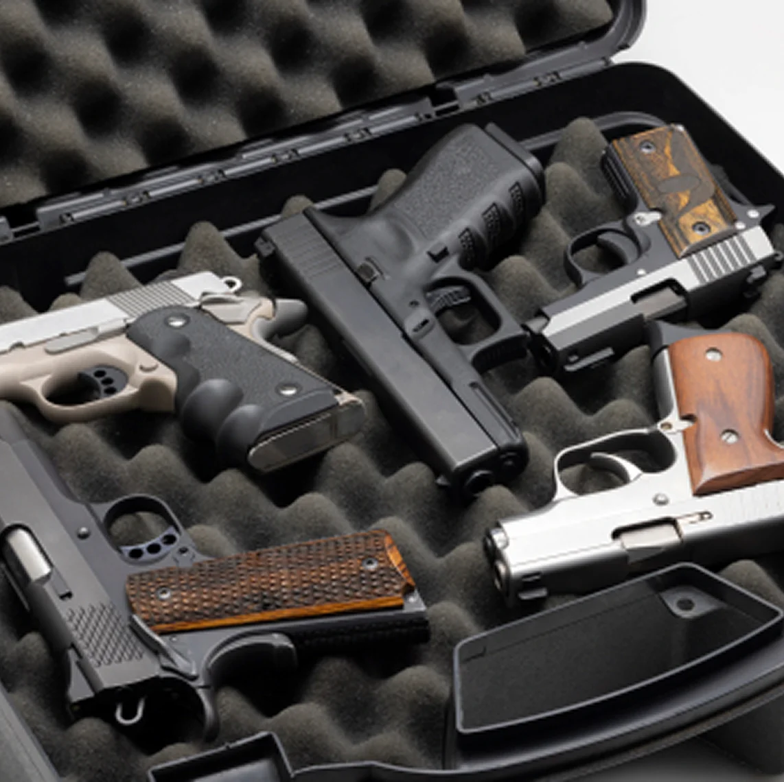 Collection of pistols in protective case